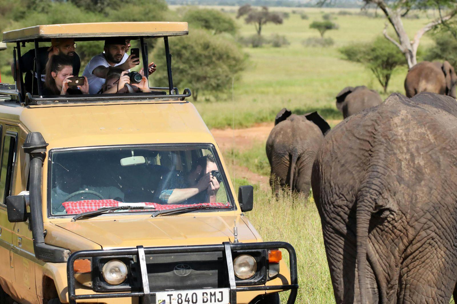 Photo of a family in a safari jeep in Tanzania