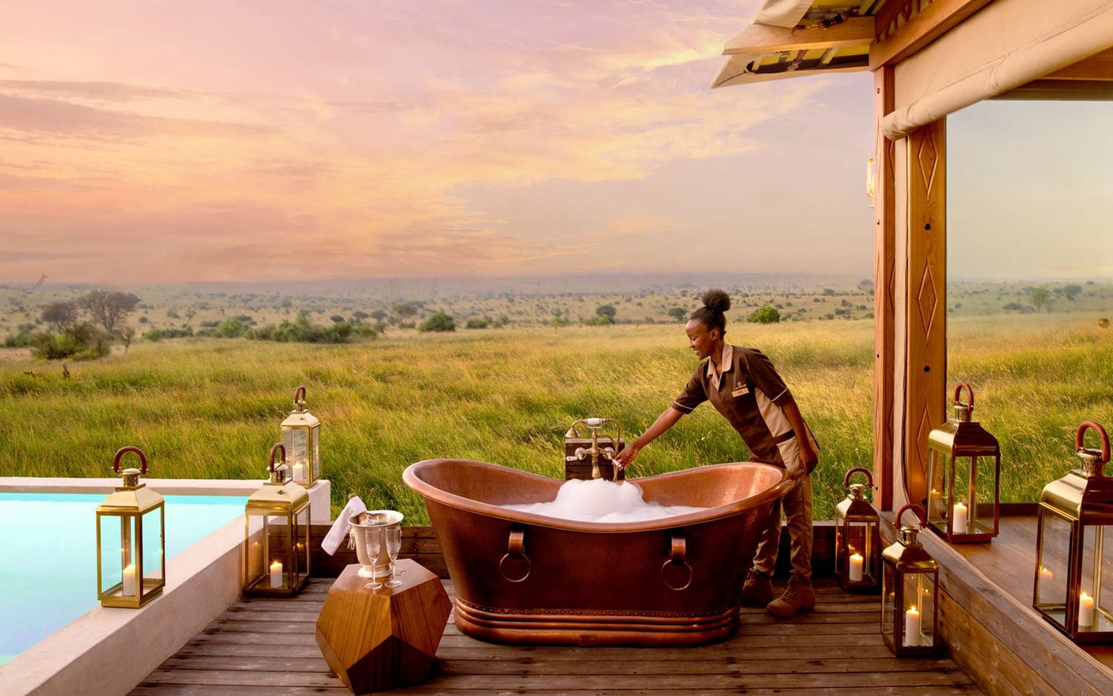 Romantic suite with copper bathtub overlooking the Mara River on a honeymoon safari